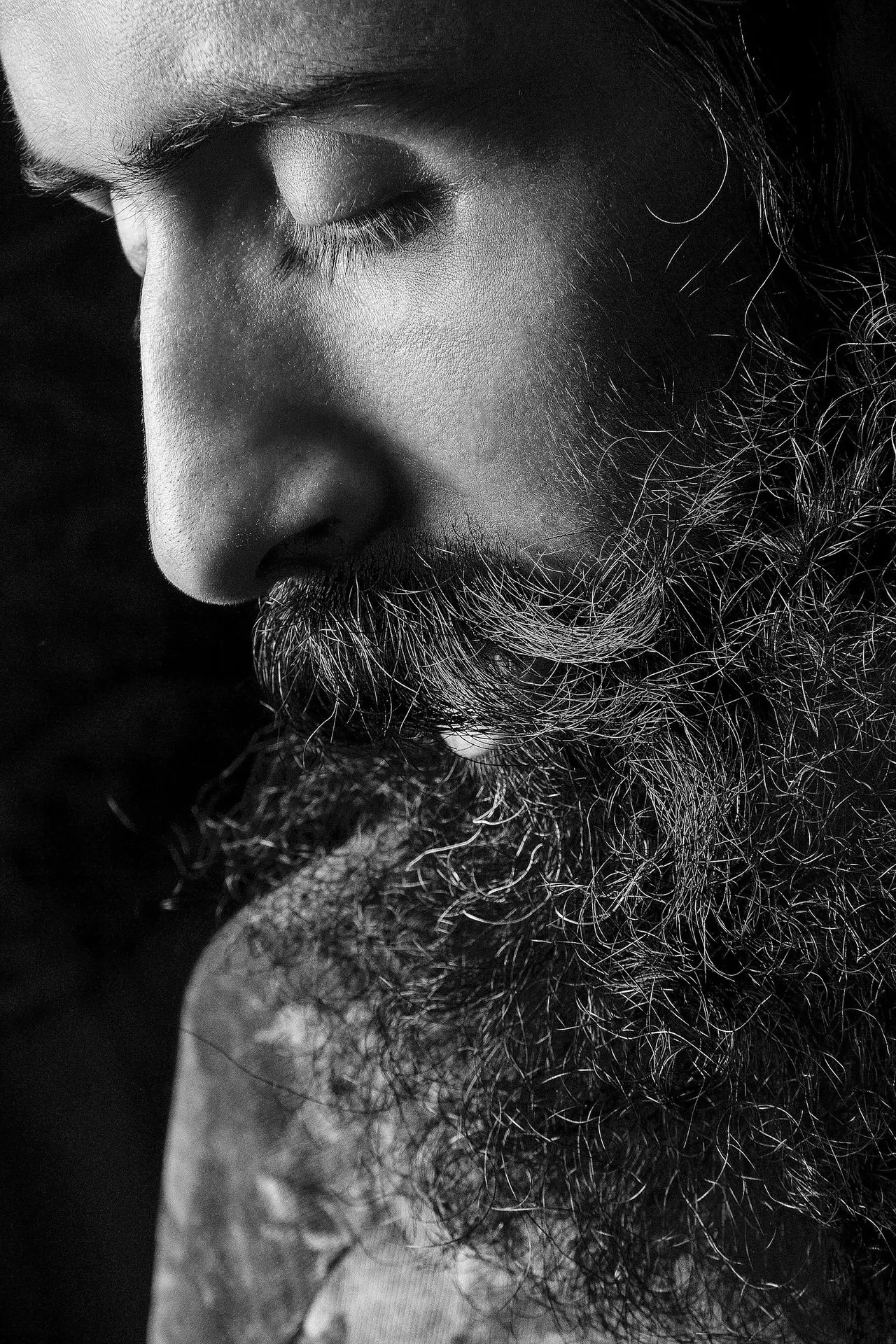grayscale photo of mans face